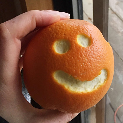 happy orange because vegan kids are happy to eat fruit